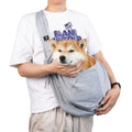 Sac de transport bandoulière pour chien et chat, coloris gris chiné, porté en bandoulière avec un shiba inu